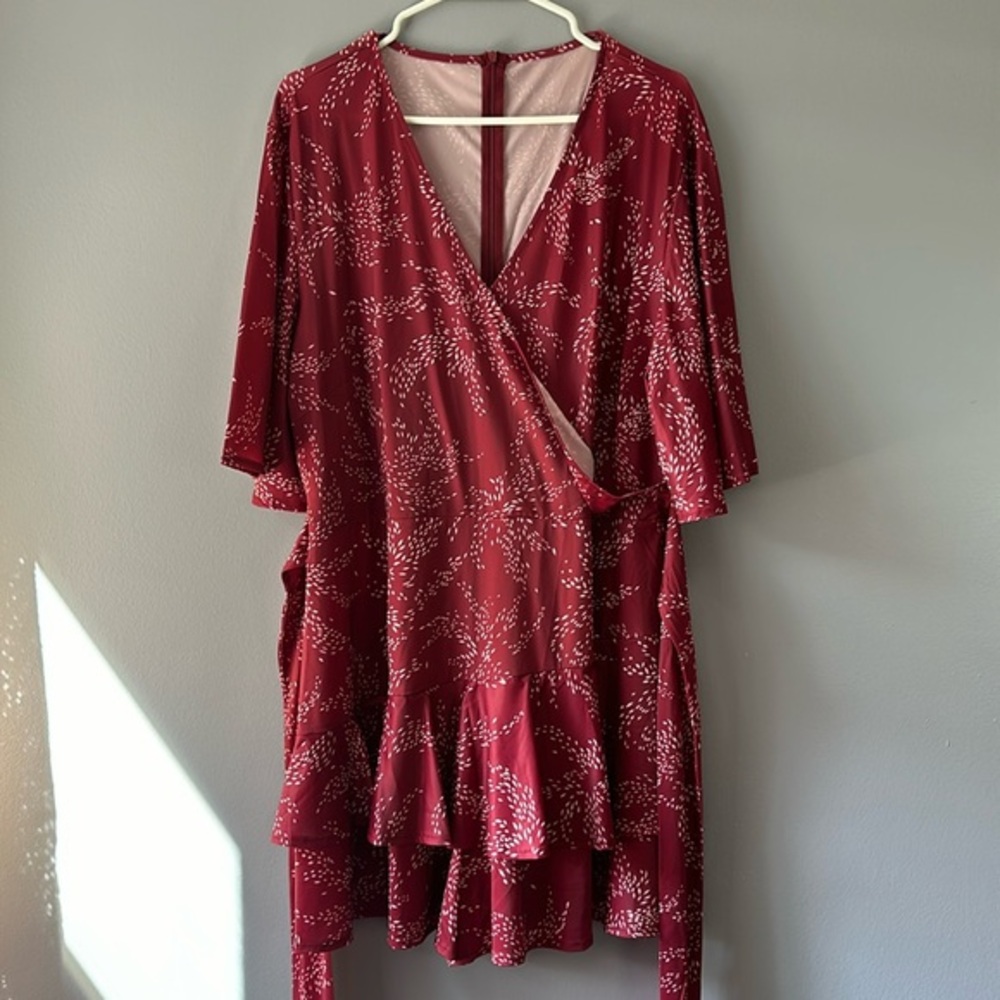 Red romper with waist tie zipper back and cleavage button